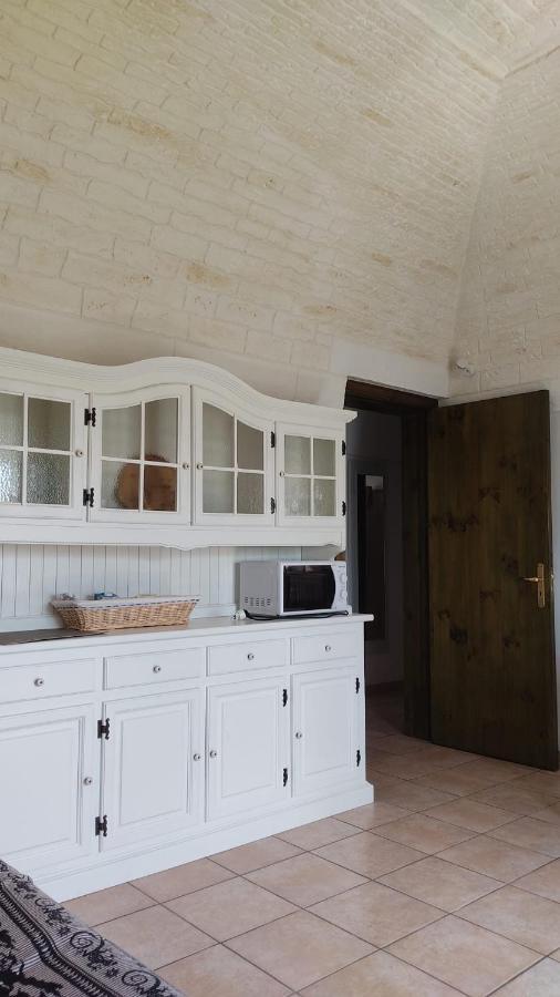 Trulli Di Zia Tata Guest House โลโกโรตอนโด ภายนอก รูปภาพ