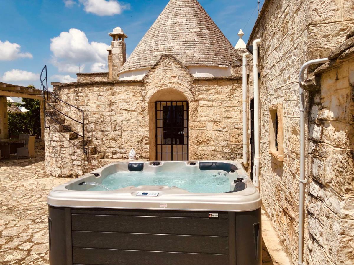 Trulli Di Zia Tata Guest House โลโกโรตอนโด ภายนอก รูปภาพ