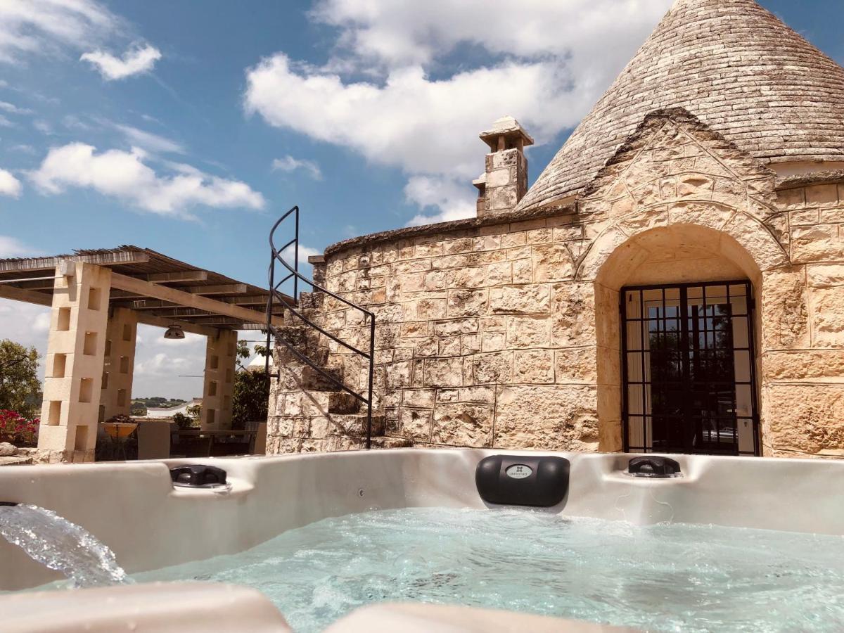 Trulli Di Zia Tata Guest House โลโกโรตอนโด ภายนอก รูปภาพ