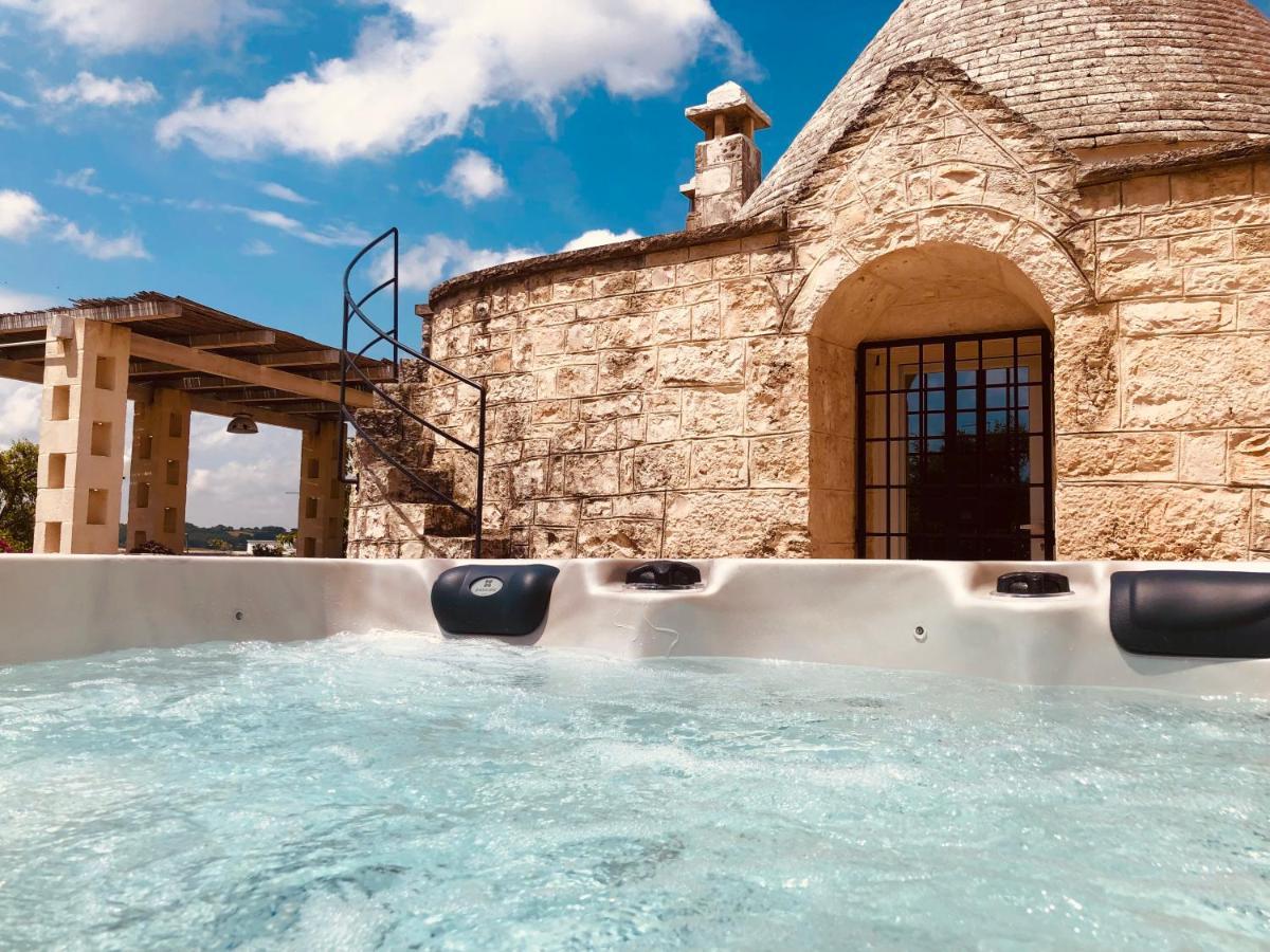 Trulli Di Zia Tata Guest House โลโกโรตอนโด ภายนอก รูปภาพ