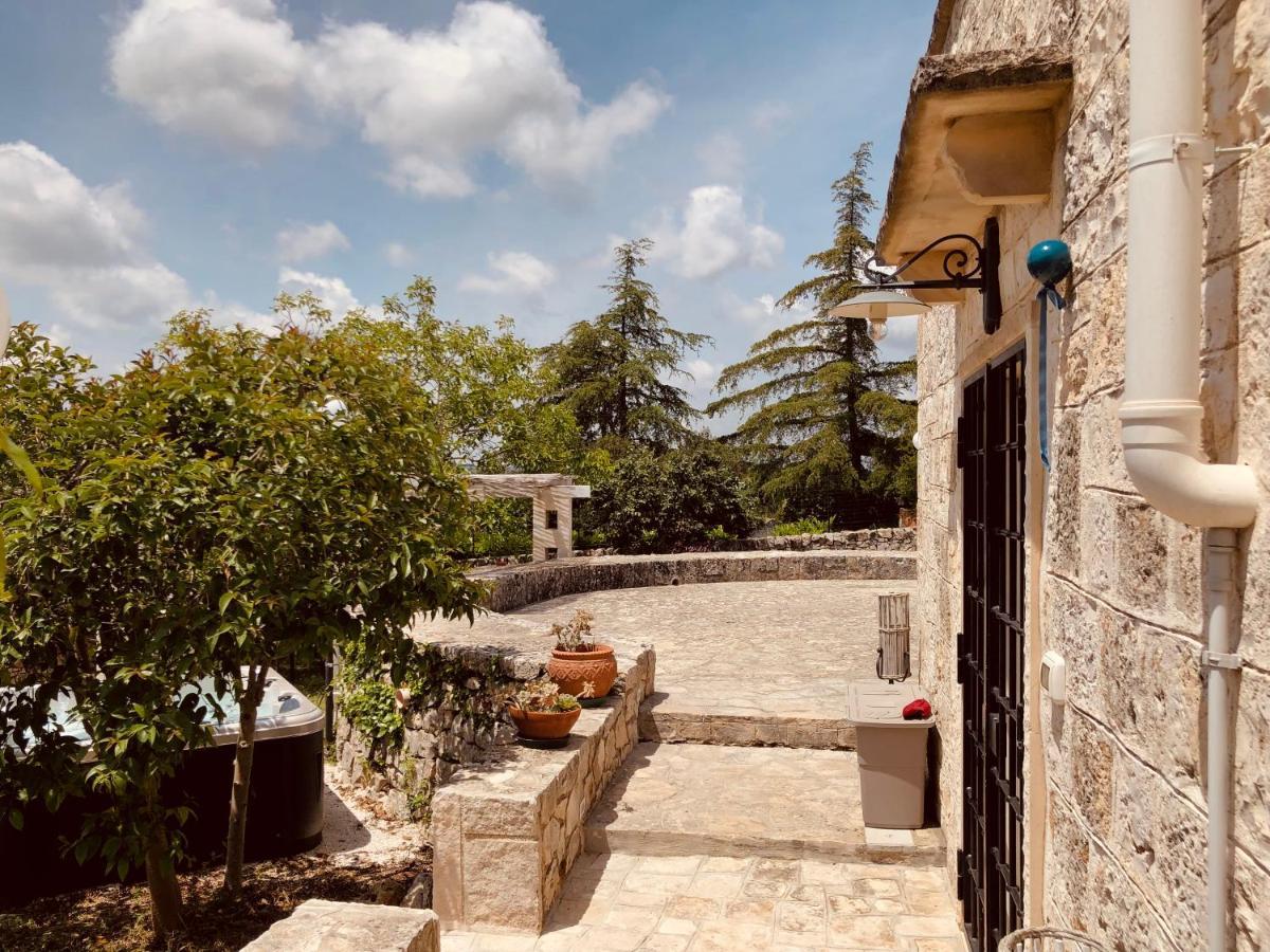 Trulli Di Zia Tata Guest House โลโกโรตอนโด ภายนอก รูปภาพ