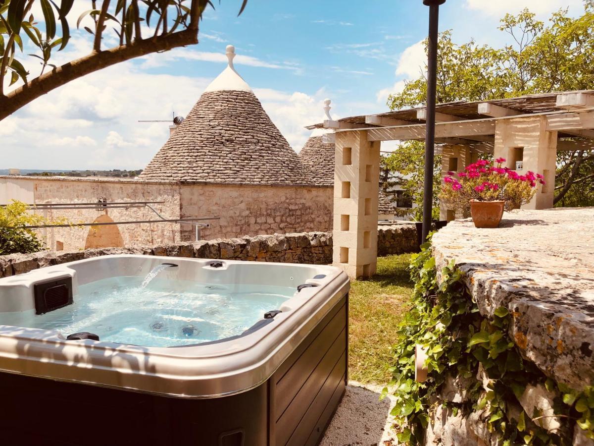Trulli Di Zia Tata Guest House โลโกโรตอนโด ภายนอก รูปภาพ