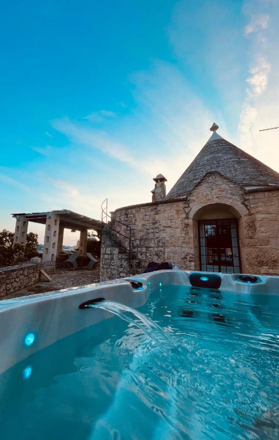 Trulli Di Zia Tata Guest House โลโกโรตอนโด ภายนอก รูปภาพ